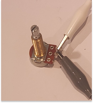 Using a knob from a guitar, AKA a 'Pot'